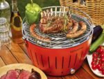 LotusGrill LG G34 U OR – Tragbarer Holzkohlegrill für draußen – Orangefarbene Außenhülle