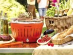 LotusGrill LG G34 U OR – Tragbarer Holzkohlegrill für draußen – Orangefarbene Außenhülle